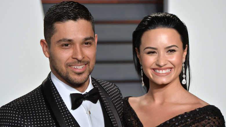 Wilmer Valderrama, Demi Lovato smiling