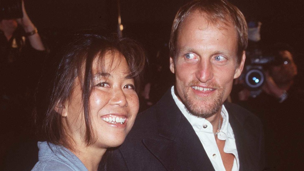 Laura Louie and Woody Harrelson on red carpet