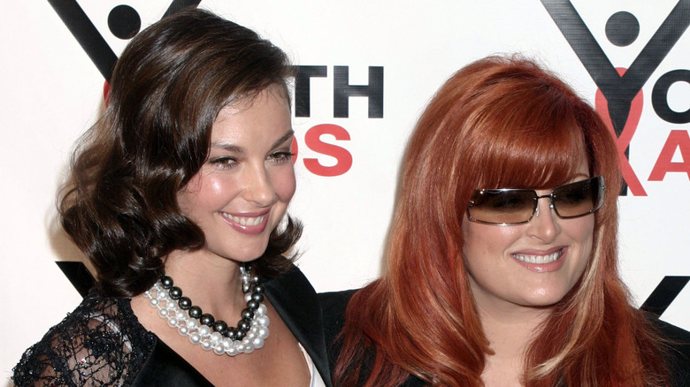 Ashley Judd smiling with Wynonna Judd