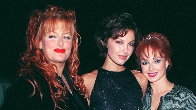 Wynonna Judd, Ashley Judd, and Naomi Judd on the red carpet