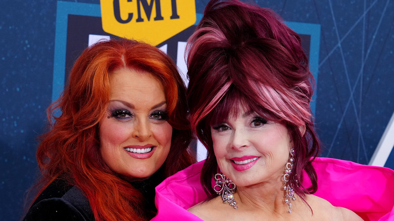 Wynonna and Naomi Judd smiling