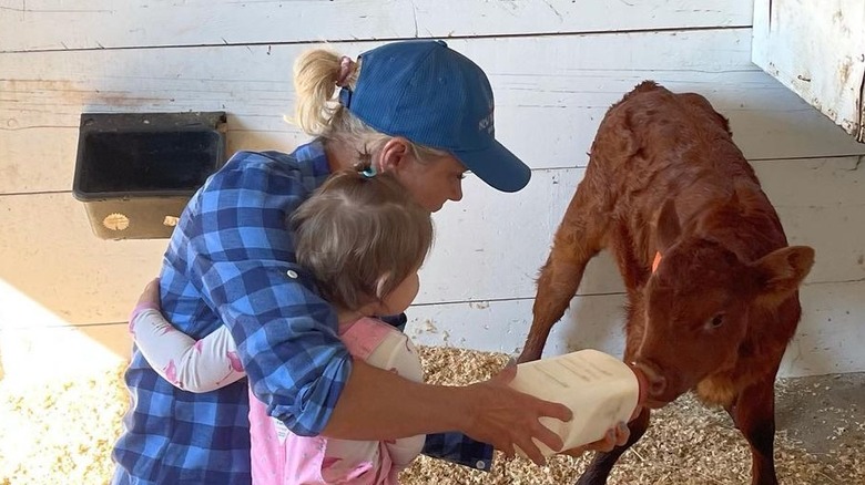 Yolanda Hadid and Khai feeding goats