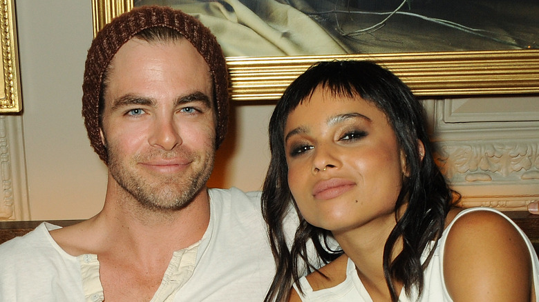 Chris Pine and Zoe Kravitz at an event, smiling sweetly