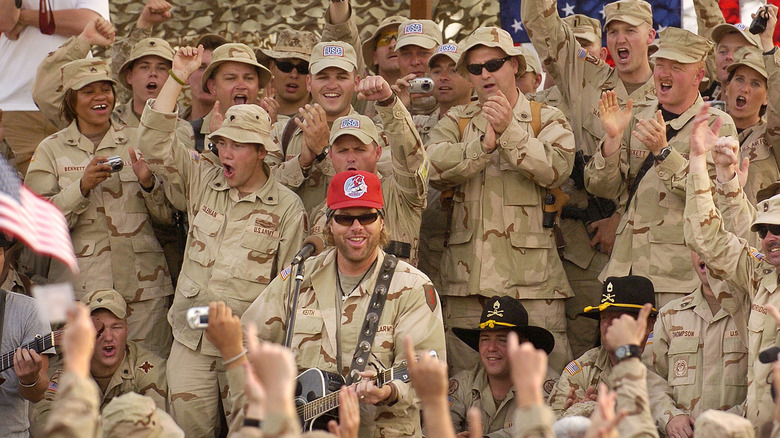 Toby Keith performing for service members