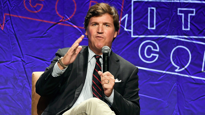 Tucker Carlson speaking at Politicon 2018