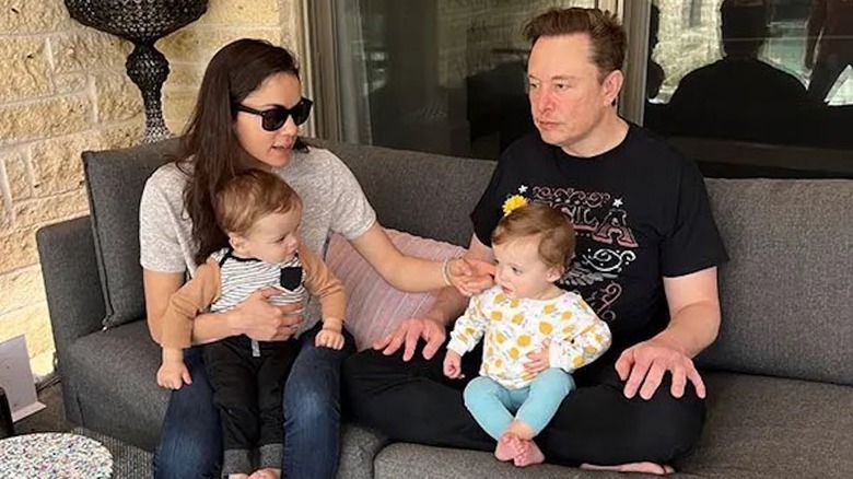 Elon Musk and Shivon Zilis sitting with their twins