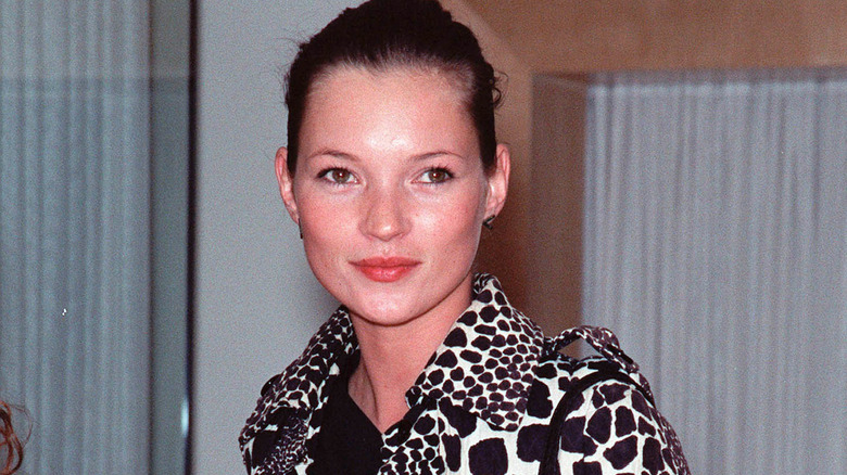 Kate Moss posing in the 90s