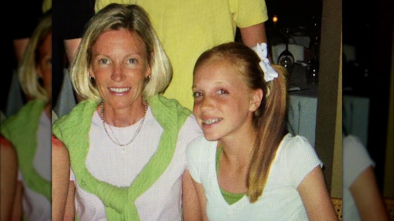 Alex Cooper as a teen with her mom