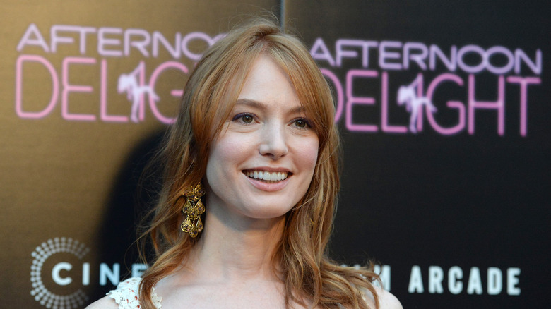 Alicia Witt posing and smiling