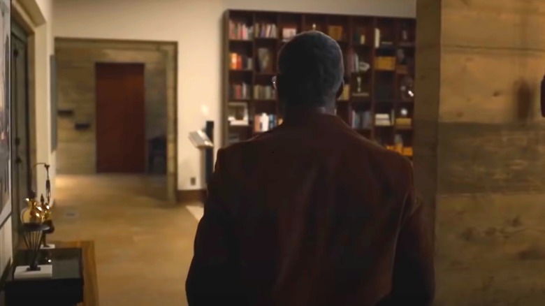 Sterling K. Brown walking inside house