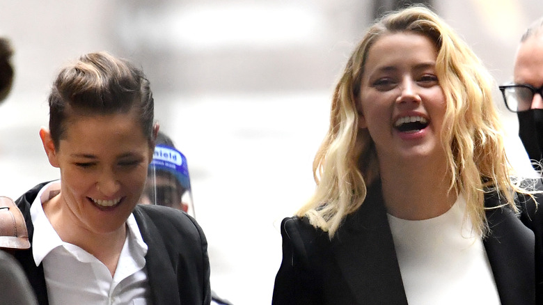 Bianca Butti and Amber Heard walking together