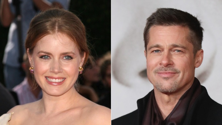 Amy Adams and Brad Pitt smiling 