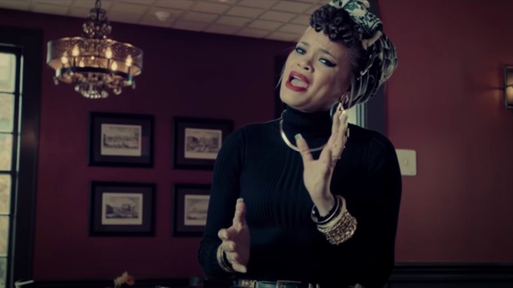 Andra Day performing in her "Rise Up" music video