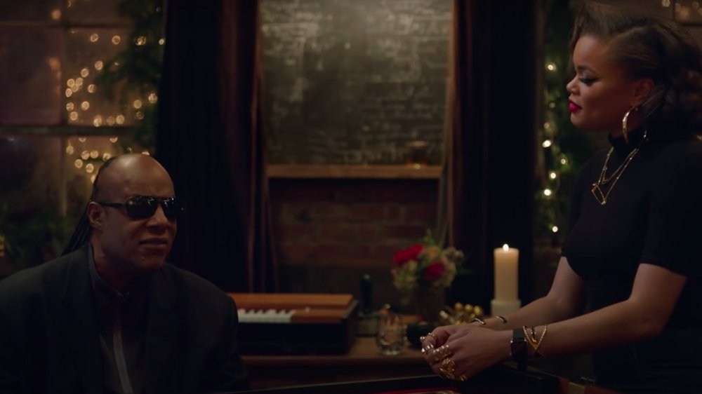 Steve Wonder and Andra Day in their "Someday at Christmas" music video