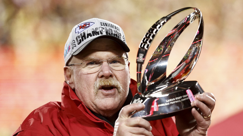 Andy Reid holding trophy