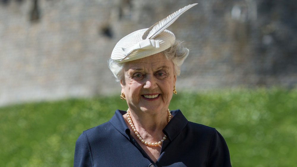 Angela Lansbury smiling in hat