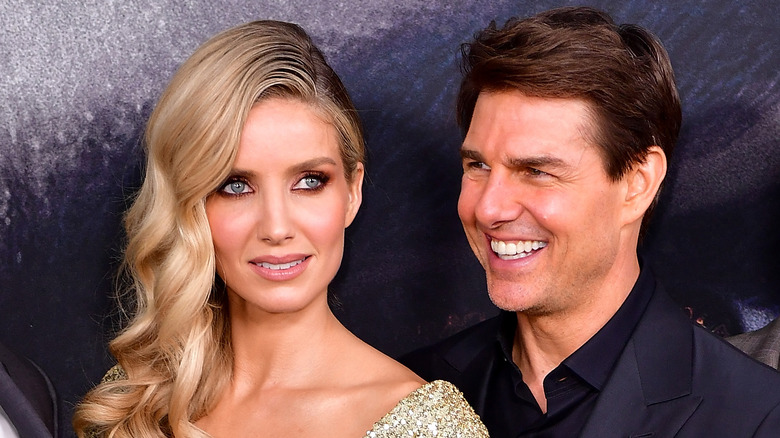 Tom Cruise and Annabelle Wallis posing at event