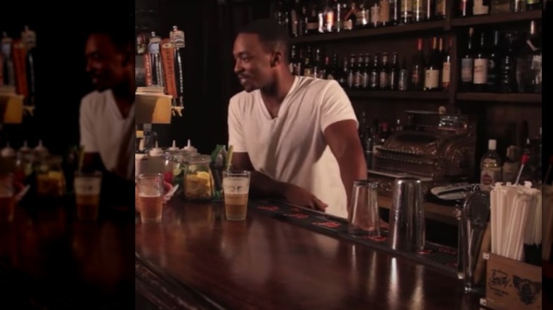 Anthony Mackie tending bar