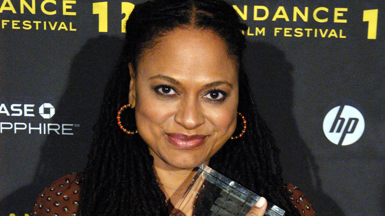 Ava DuVernay smiling with award