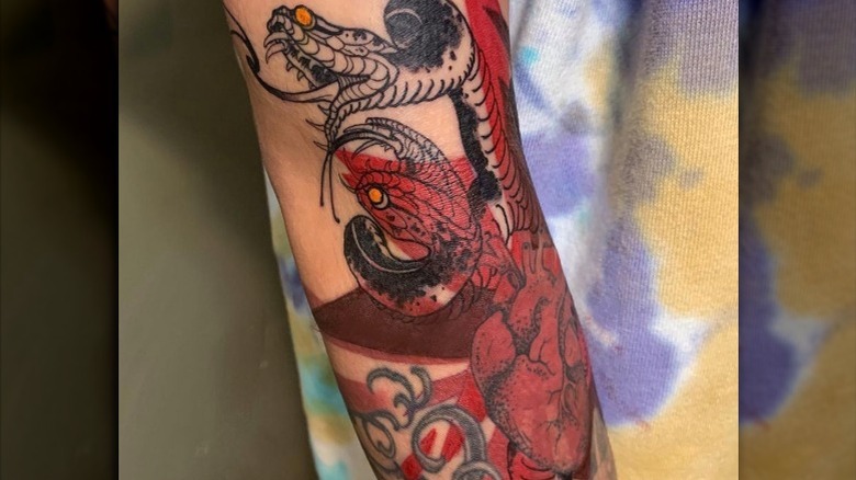 Bella Poarch's covered rising sun flag tattoo