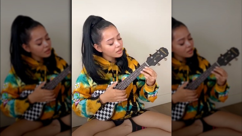 Bella Poarch playing ukulele