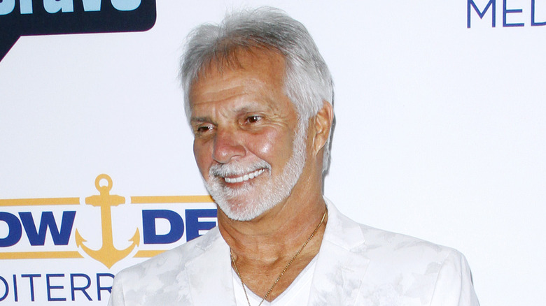 Tanned Captain Lee smiling