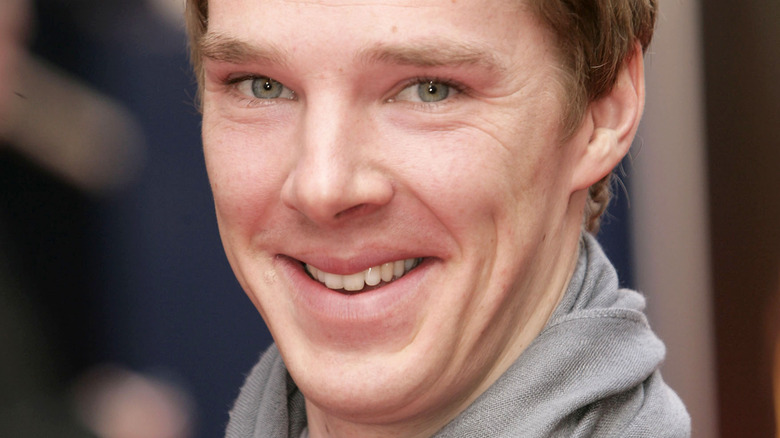 Benedict Cumberbatch wearing a scarf, smiling