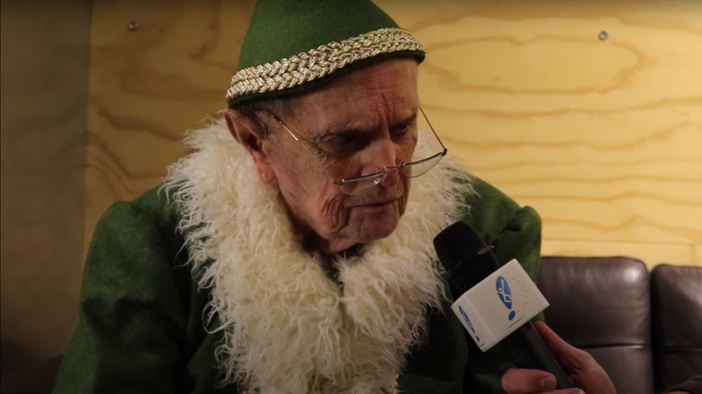 Bob Newhart dressed as Papa Elf