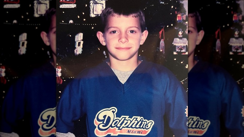 Young Braxton Berrios in a Miami Dophins jersey