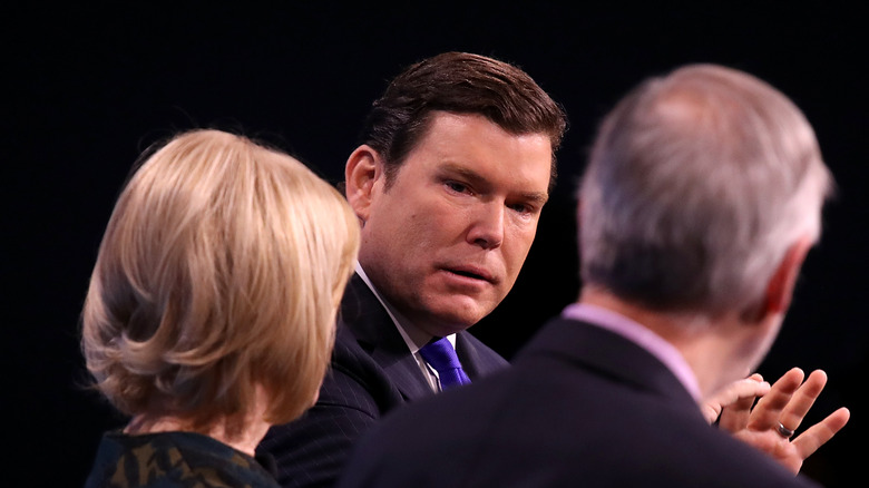 Bret Baier on stage, speaking