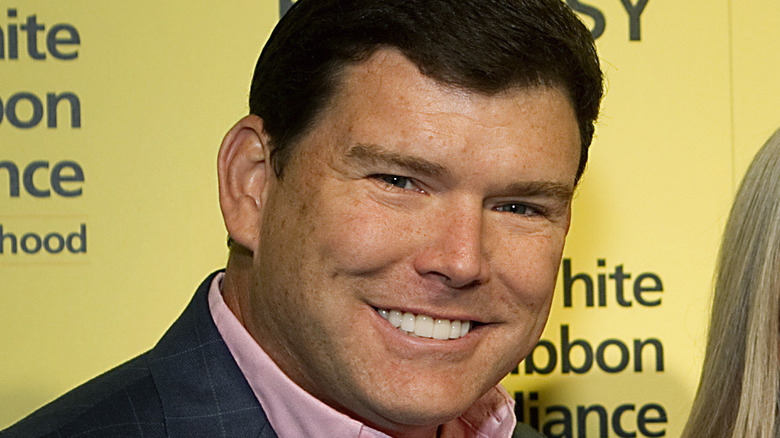 Bret Baier posing for cameras, smiling