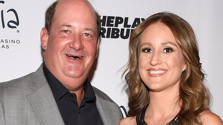 Brian Baumgartner and Celeste Ackelson, smiling together