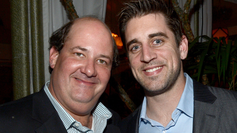 Brian Baumgartner and Aaron Rodgers, both smiling