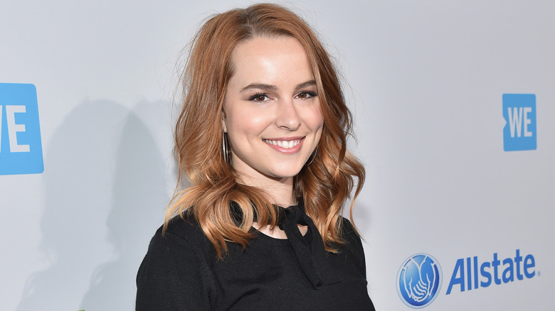 Bridgit Mendler at a charity event, smiling