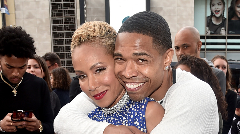 Jada Pinkett Smith and Caleeb Pinkett hugging