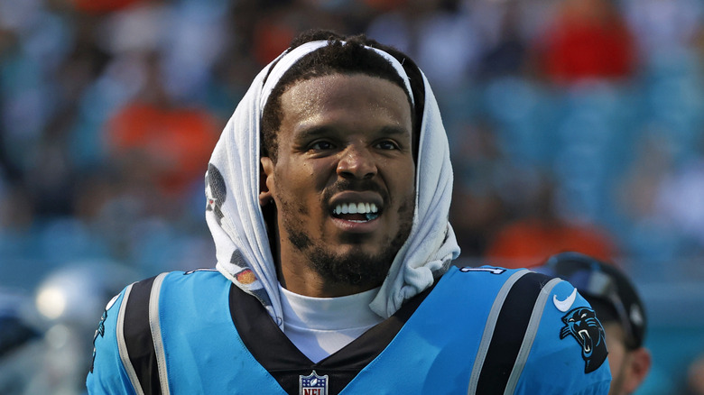 Cam Newton wears white towel