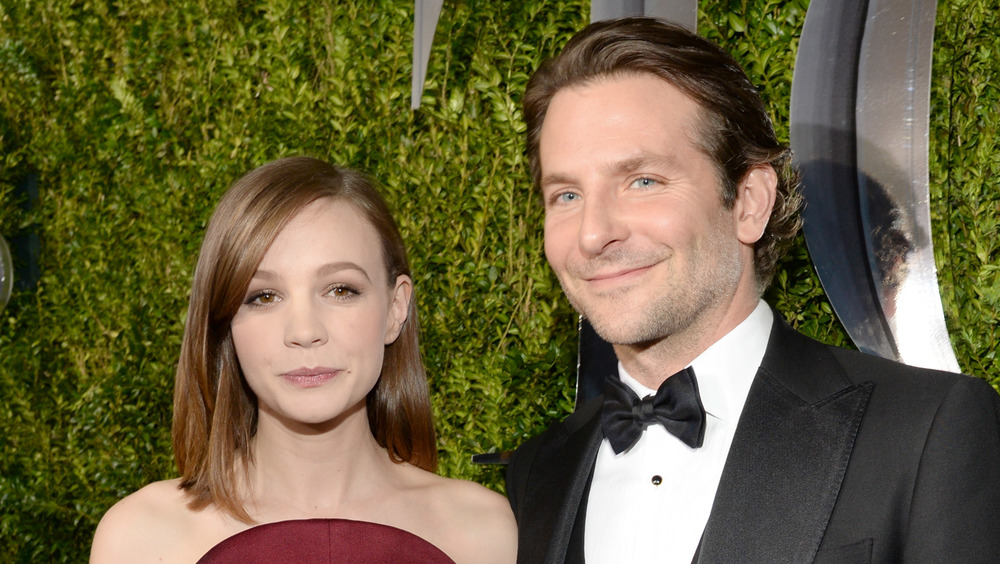 Carey Mulligan and Bradley Cooper posing together