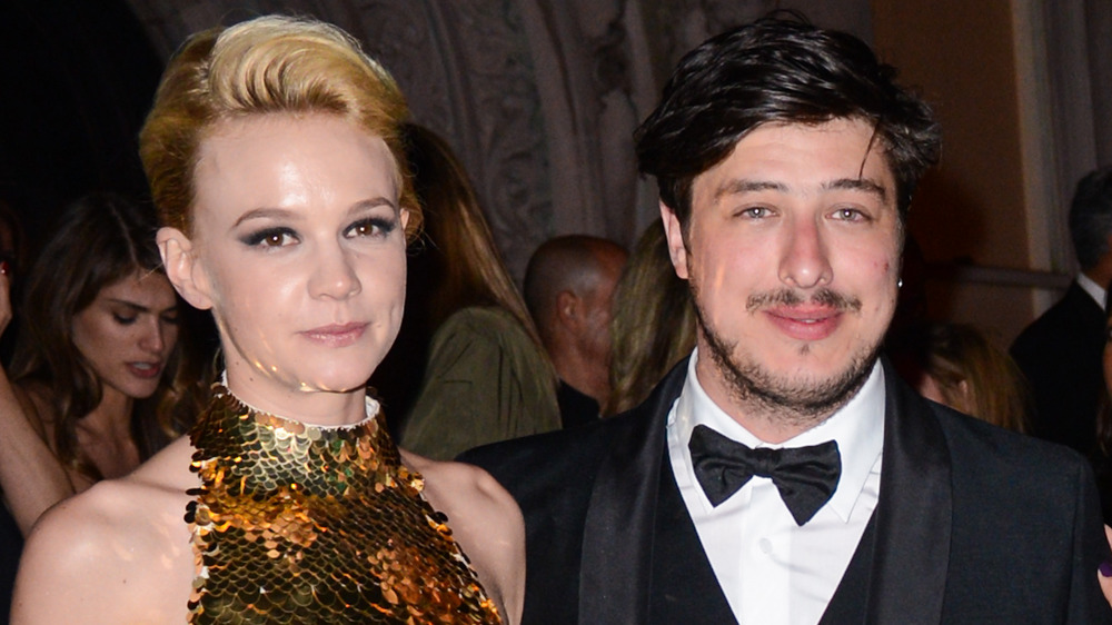 Carey Mulligan and Marcus Mumford grinning