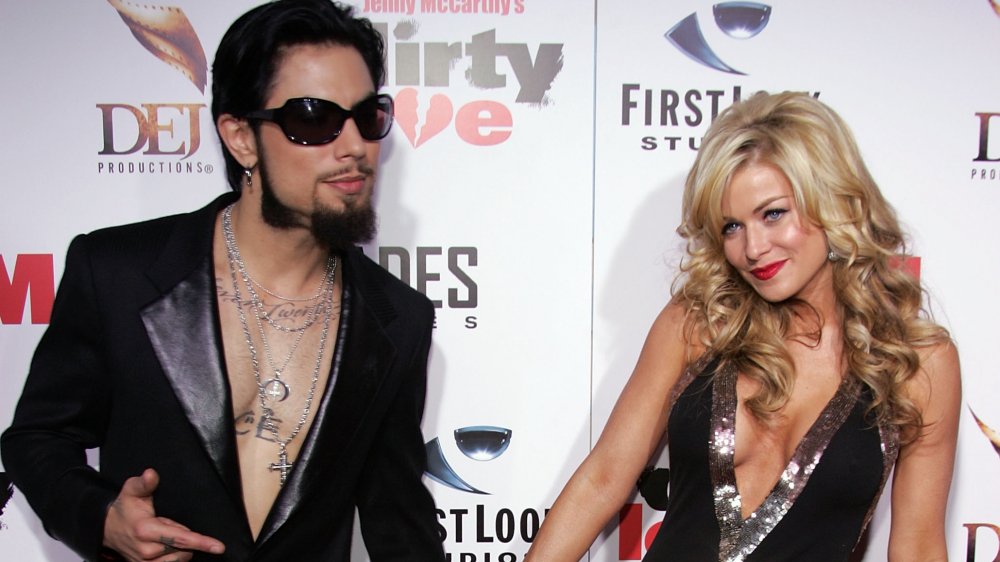 Dave Navarro and Carmen Electra holding hands