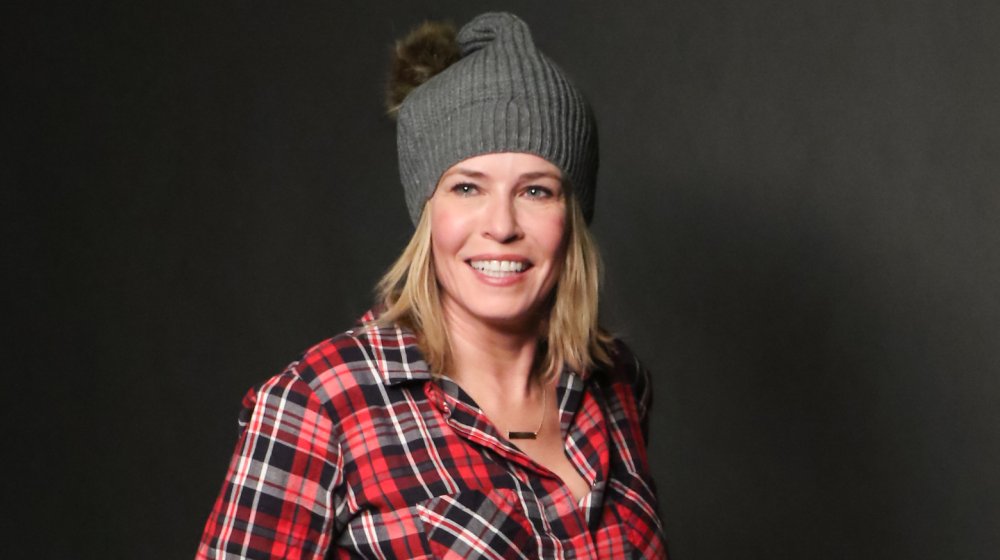 Chelsea Handler in a grey winter hat and red flannel