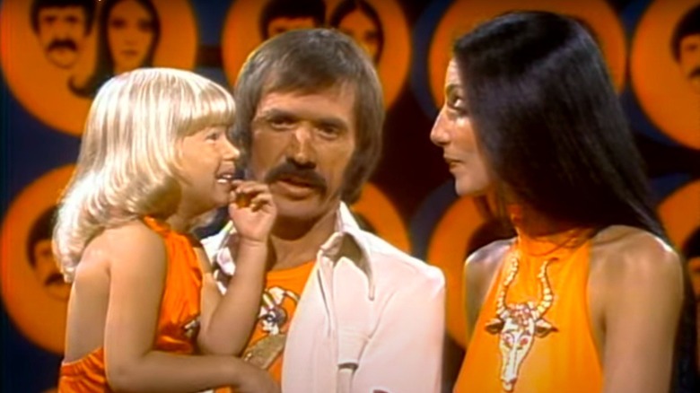 Chaz Bono, Sonny, and Cher talking together on The Sonny & Cher Comedy Hour