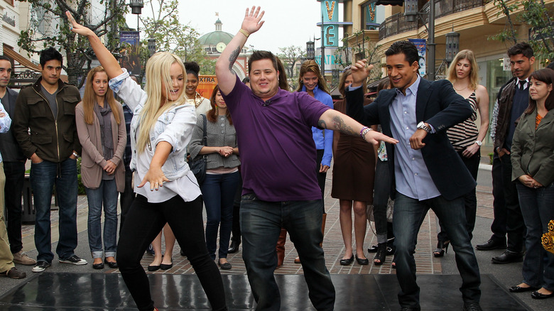 Lacey Schwimmer and Chaz Bono dancing with Mario Lopez