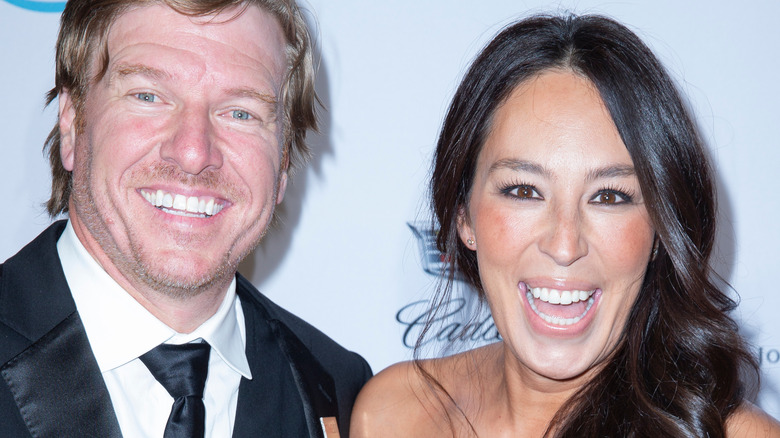 Chip and Joanna Gaines at an event, smiling