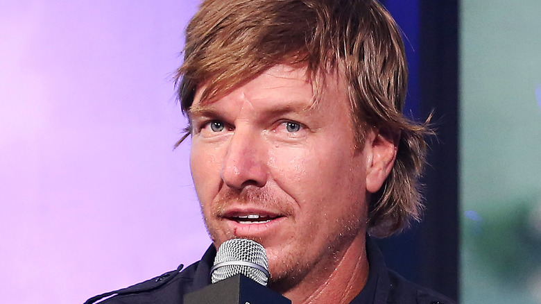 Chip Gaines speaking into microphone