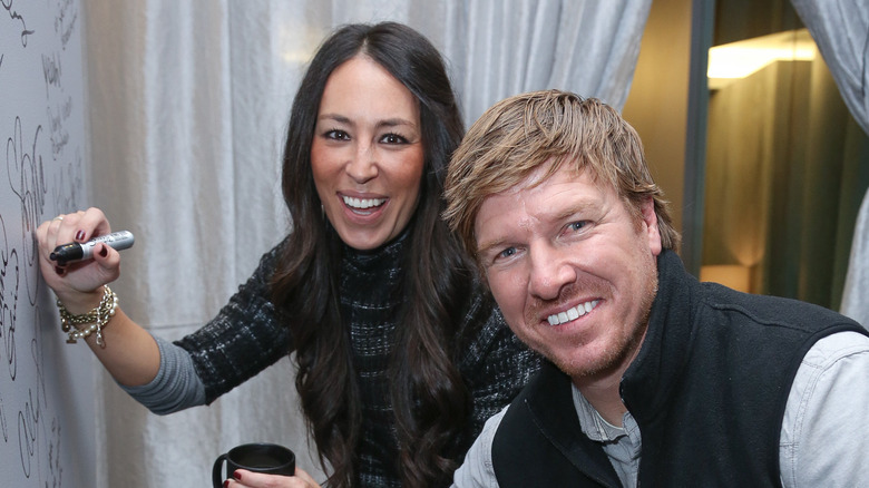 Chip and Joanna Gaines at an event, smiling