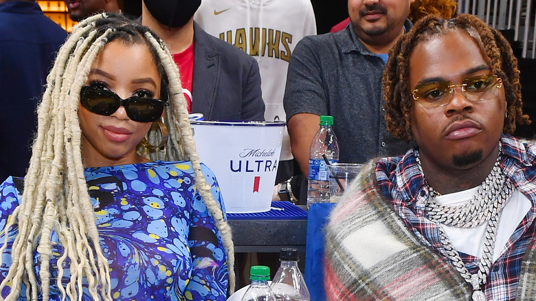 Chlöe Bailey and Gunna, seated and posing