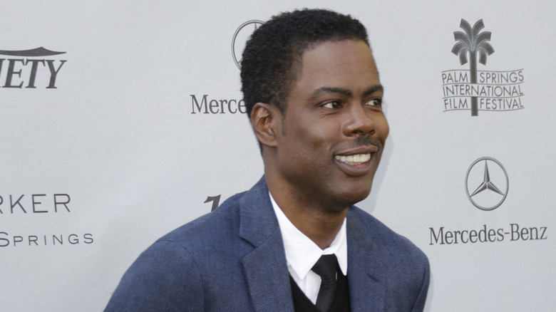 Chris Rock smiles