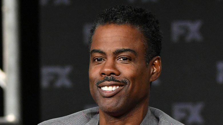 Chris Rock on smiling stage