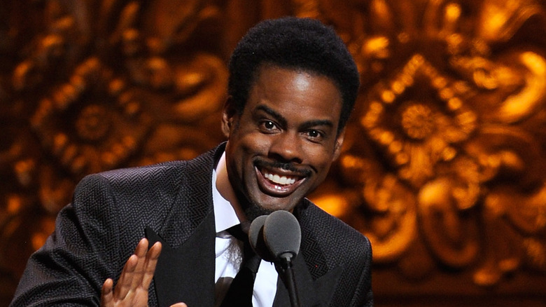 Chris Rock staring at camera