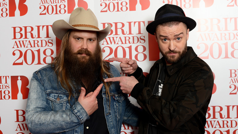 Chris Stapleton posing with Justin Timberlake 